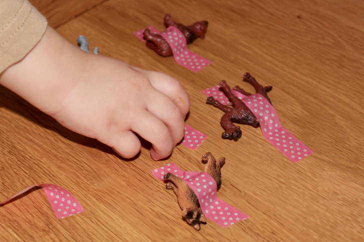 The “Rescue Wall” Tape Game (a no-mess sensory activity that still scratches the sticky itch)